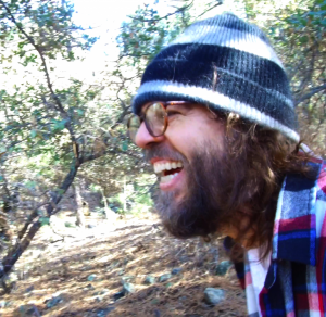 Indie Alternative Duo Dutch Holly's Tres Ikner laughs in the forest
